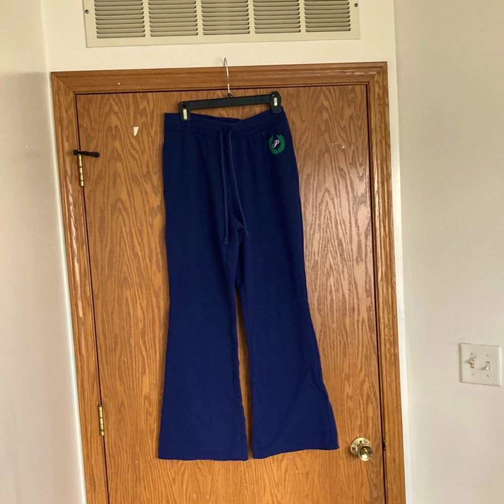 Blue Flared Pants with Green Logo